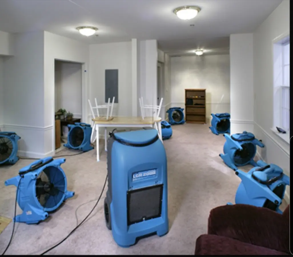 Air movers and dehumidifier setup for Water Damage Restoration in Sylvester
